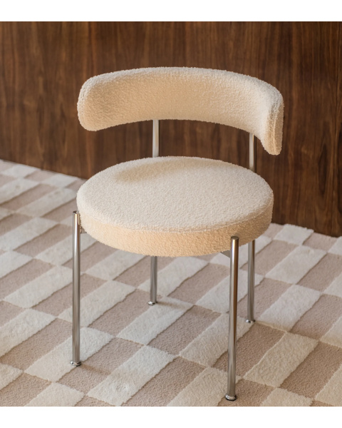 Cream white boucle chair in wool and chrome metal Cream white boucle chair in wool and chrome metal