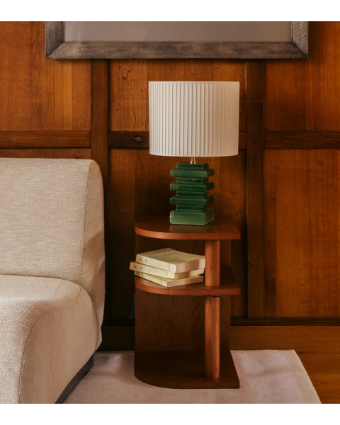 Green ceramic table lamp with cream pleated cotton shade
