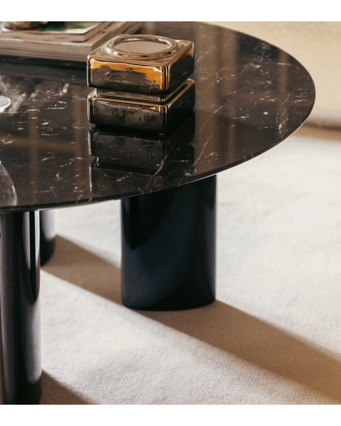 Table basse ronde marbre noir et pieds noirs