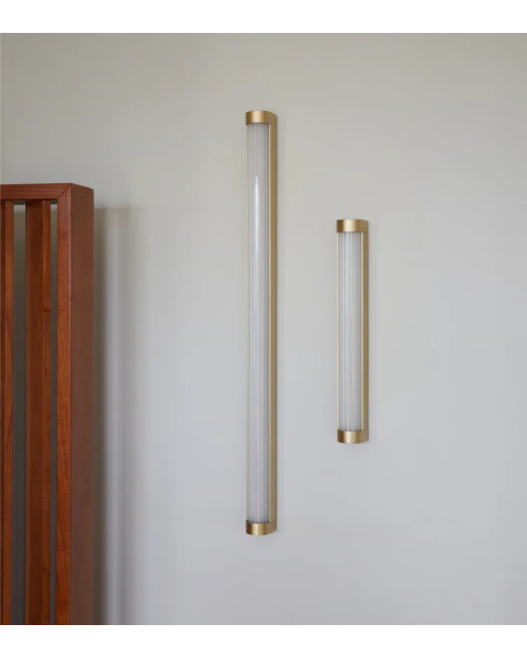 Large brushed metal wall light with brass finish