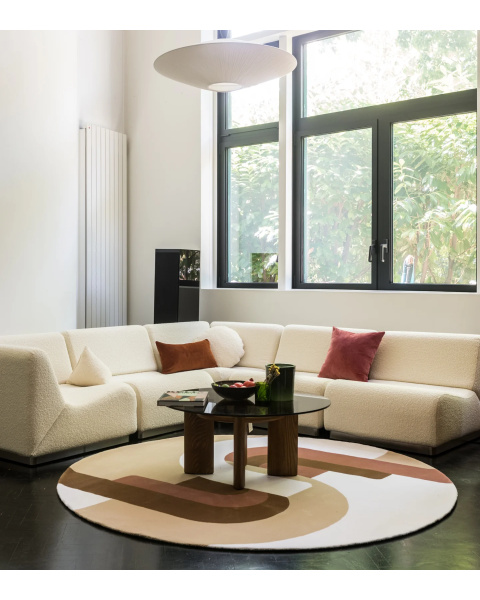 Beige and pink round wool rug